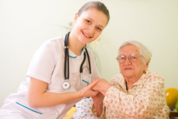 Nurse with an elder female patient