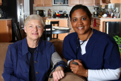 Nurse with an elder female patient